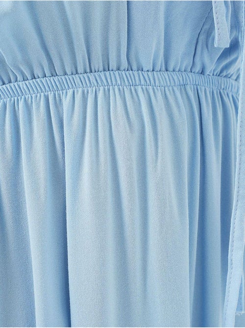 Vestido midi de corte a con escote en v y detalle de ribete bdart - Kiabi Vestido midi de corte a con escote en v y detalle de ribete bdart - Kiabi