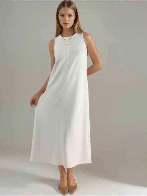 Vestido midi de corte relajado con cuello redondo hiccup - Kiabi Vestido midi de corte relajado con cuello redondo hiccup - Kiabi