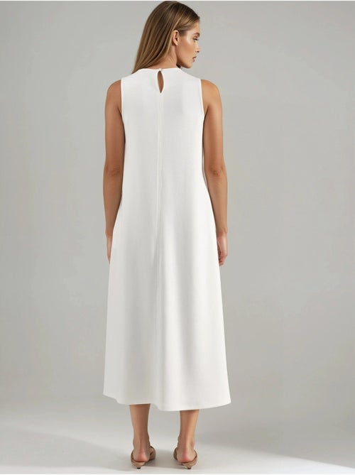 Vestido midi de corte relajado con cuello redondo hiccup - Kiabi Vestido midi de corte relajado con cuello redondo hiccup - Kiabi