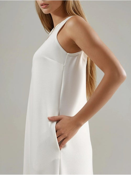 Vestido midi de corte relajado con cuello redondo hiccup - Kiabi Vestido midi de corte relajado con cuello redondo hiccup - Kiabi