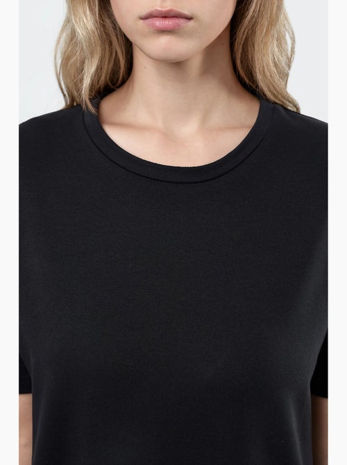 Vestido midi de corte relajado con cuello redondo hiccup - Kiabi Vestido midi de corte relajado con cuello redondo hiccup - Kiabi