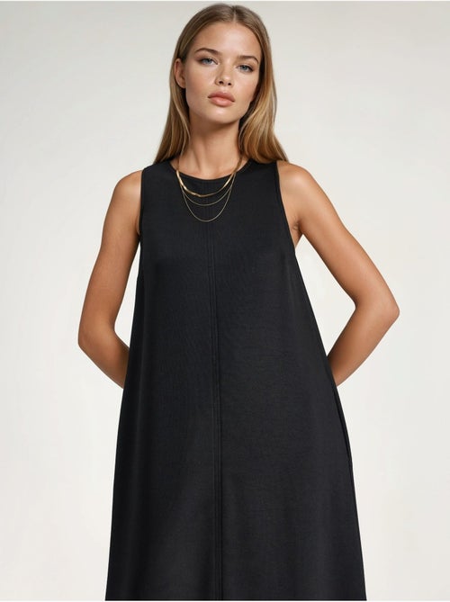 Vestido midi de corte relajado con cuello redondo hiccup - Kiabi Vestido midi de corte relajado con cuello redondo hiccup - Kiabi