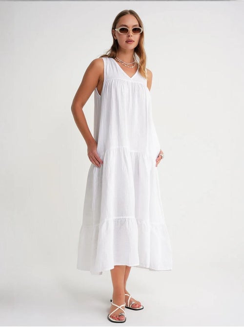 Vestido midi de muselina con cuello en v, sin mangas y bolsillos de mixray - Kiabi Vestido midi de muselina con cuello en v, sin mangas y bolsillos de mixray - Kiabi