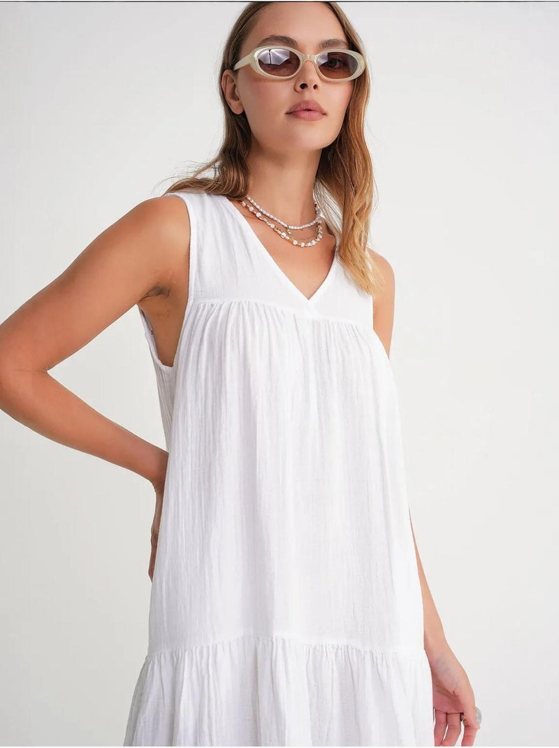 Vestido midi de muselina con cuello en v, sin mangas y bolsillos de mixray Blanco - Kiabi