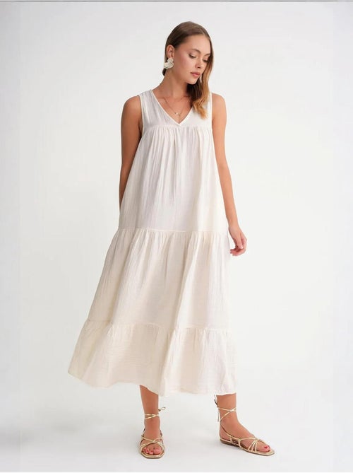 Vestido midi de muselina con cuello en v, sin mangas y bolsillos de mixray - Kiabi Vestido midi de muselina con cuello en v, sin mangas y bolsillos de mixray - Kiabi