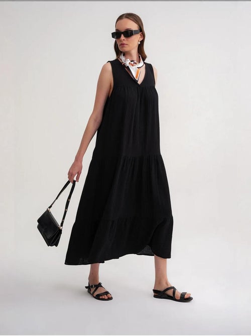 Vestido midi de muselina con cuello en v, sin mangas y bolsillos de mixray - Kiabi Vestido midi de muselina con cuello en v, sin mangas y bolsillos de mixray - Kiabi