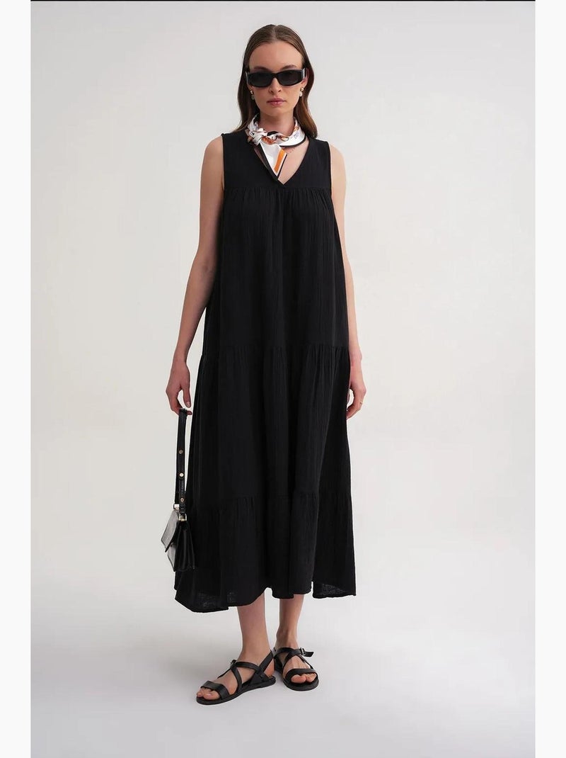 Vestido midi de muselina con cuello en v, sin mangas y bolsillos de mixray Negro - Kiabi