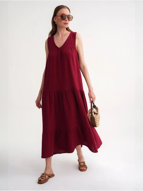 Vestido midi de muselina con cuello en v, sin mangas y bolsillos de mixray - Kiabi Vestido midi de muselina con cuello en v, sin mangas y bolsillos de mixray - Kiabi