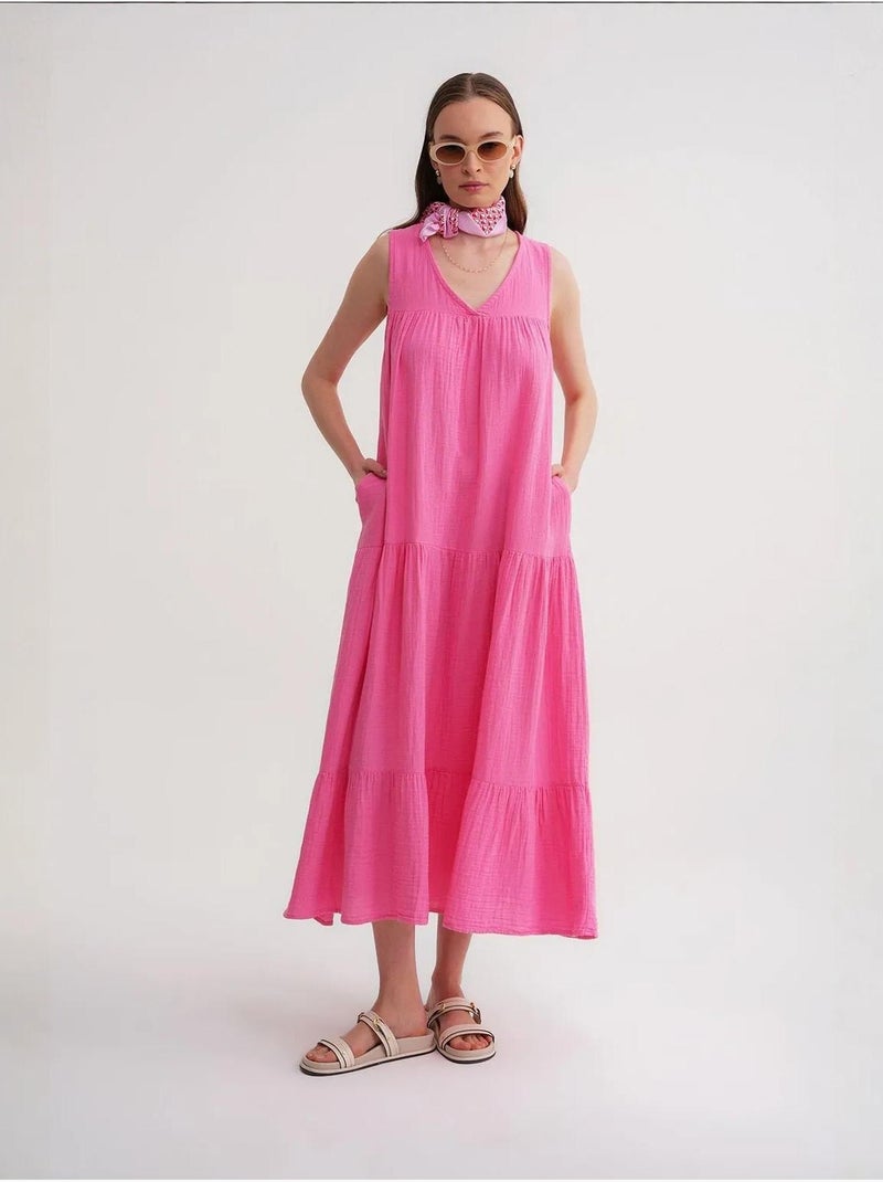 Vestido midi de muselina con cuello en v, sin mangas y bolsillos de mixray Rosa fluo/Solinotes - Kiabi