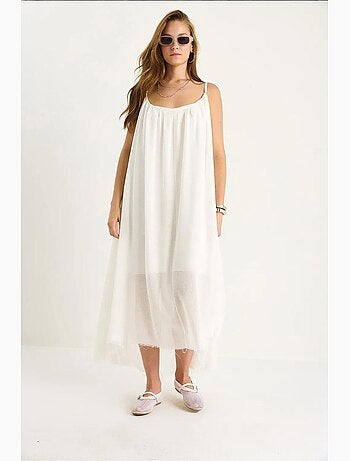 Vestido midi de muselina lisa con tirantes finos y bajo transparente lucci