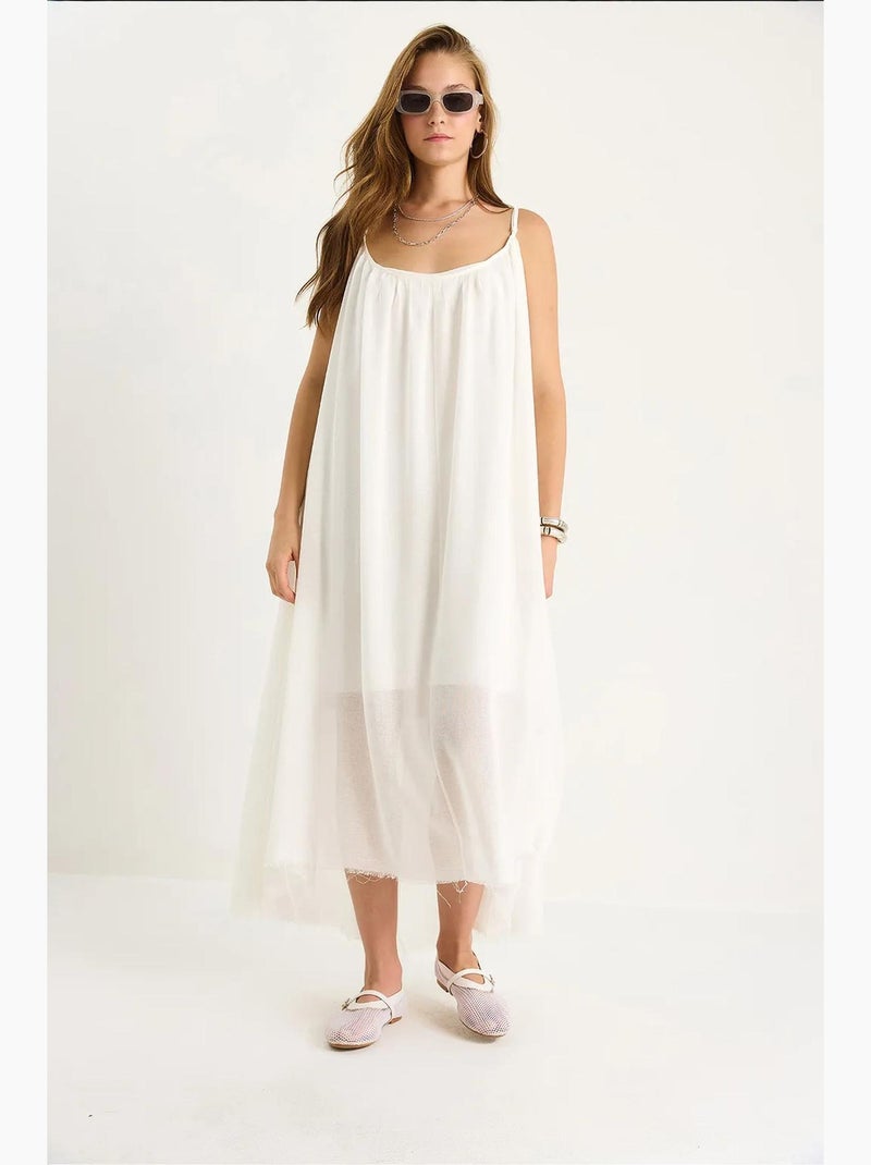 Vestido midi de muselina lisa con tirantes finos y bajo transparente lucci Blanco - Kiabi