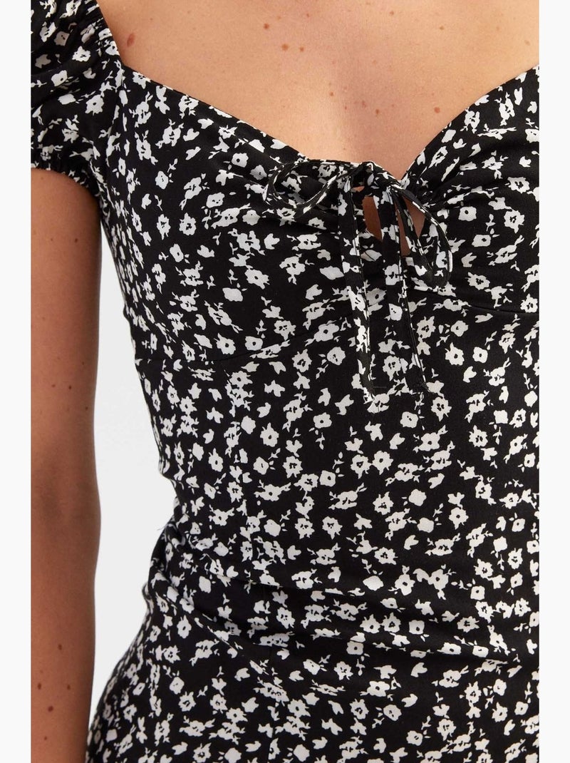 Vestido midi floral con hombros descubiertos y abertura lateral hiccup Negro - Kiabi