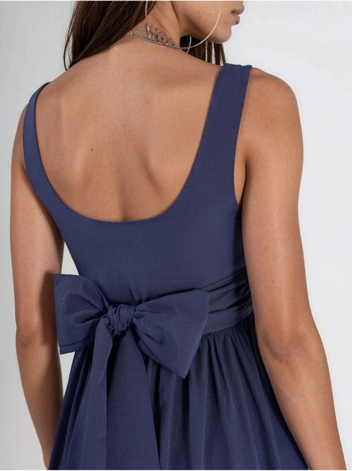 Vestido midi sin mangas con escote redondeado busem - Kiabi Vestido midi sin mangas con escote redondeado busem - Kiabi