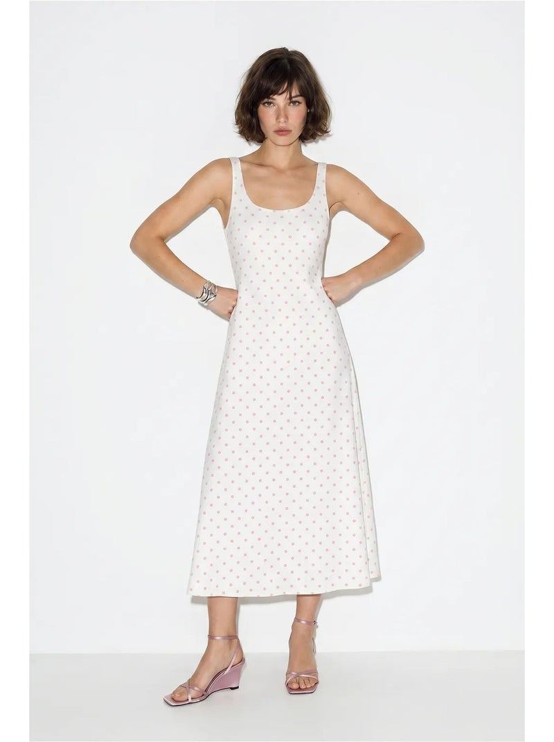 Vestido midi sin mangas de lunares con detalle de lazada lucci Blanco - Kiabi