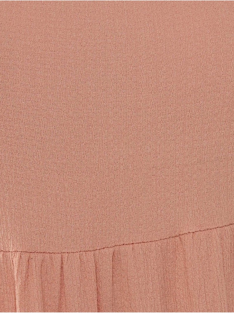 Vestido midi texturizado con corte en A Rosa - Kiabi