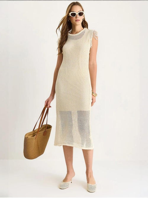 Vestido midi texturizado con detalle de volantes lucci - Kiabi Vestido midi texturizado con detalle de volantes lucci - Kiabi