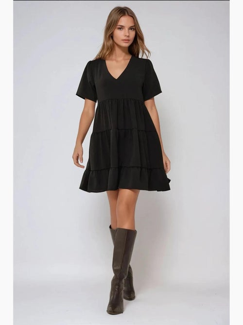 Vestido mini con escote en v y corte a hiccup - Kiabi Vestido mini con escote en v y corte a hiccup - Kiabi