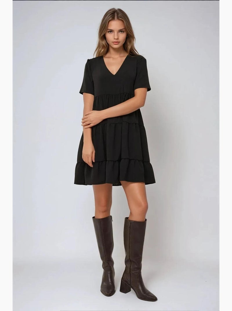 Vestido mini con escote en v y corte a hiccup Negro - Kiabi