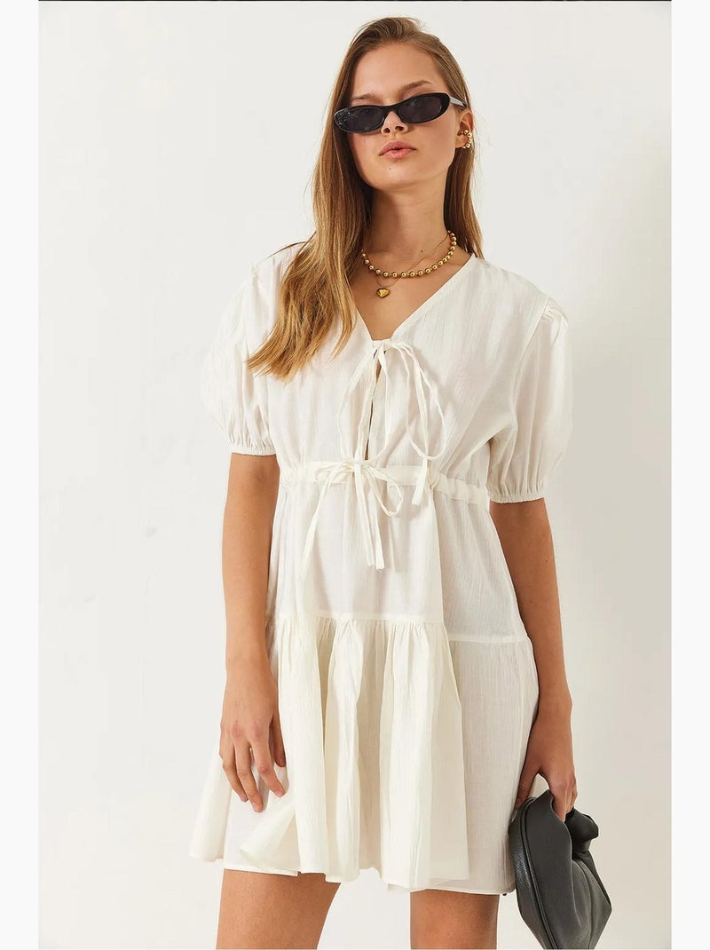 Vestido mini tamara con escote en v y lazo delantero lucci Beige arcilla - Kiabi
