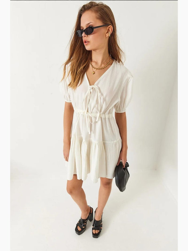 Vestido mini tamara con escote en v y lazo delantero lucci Beige arcilla - Kiabi
