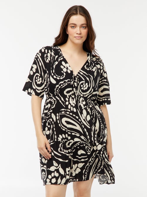 Vestido trapecio estampado con volante en el bajo - Kiabi