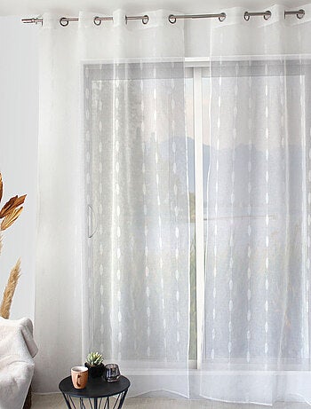 Visillo jacquard con lunares ovalados y ojales metálicos