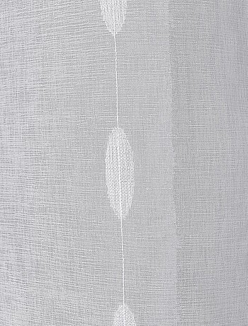 Visillo jacquard con lunares ovalados y ojales metálicos