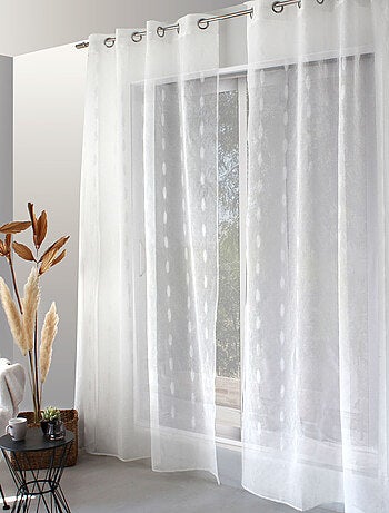 Visillo jacquard con lunares ovalados y ojales metálicos