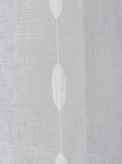 Visillo jacquard con lunares ovalados y ojales metálicos - Kiabi Visillo jacquard con lunares ovalados y ojales metálicos - Kiabi