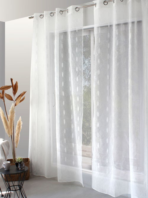 Visillo jacquard con lunares ovalados y ojales metálicos - Kiabi Visillo jacquard con lunares ovalados y ojales metálicos - Kiabi