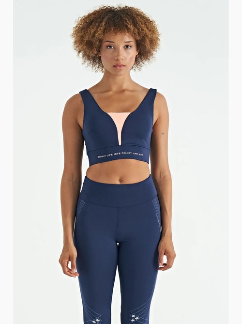 Women's top deportivo corto sin mangas con bloques de color tommy - Kiabi Women's top deportivo corto sin mangas con bloques de color tommy - Kiabi