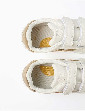 Zapatillas bajas a rayas con tiras autoadherentes