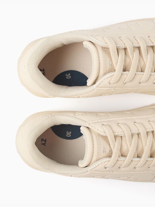 Zapatillas bajas con lazos en relieve y cordones elásticos - Kiabi Zapatillas bajas con lazos en relieve y cordones elásticos - Kiabi