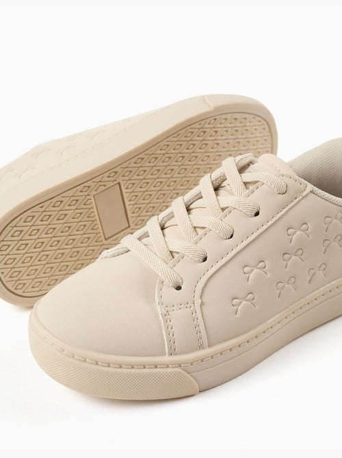 Zapatillas bajas con lazos en relieve y cordones elásticos - Kiabi Zapatillas bajas con lazos en relieve y cordones elásticos - Kiabi