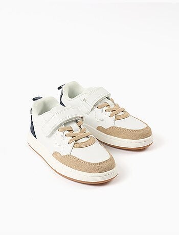 Zapatillas deportivas combinadas con tira autoadherente