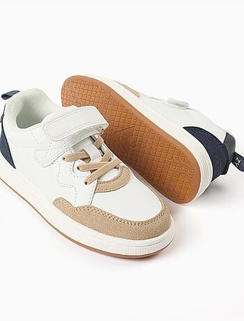 Zapatillas deportivas combinadas con tira autoadherente