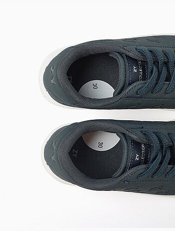 Zapatillas deportivas con lazos en relieve y cordones elásticos