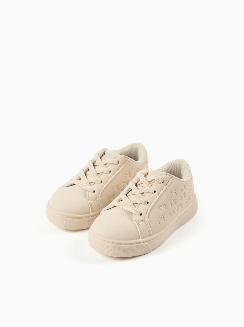 Zapatillas deportivas con lazos en relieve y cordones elásticos Beige - Kiabi